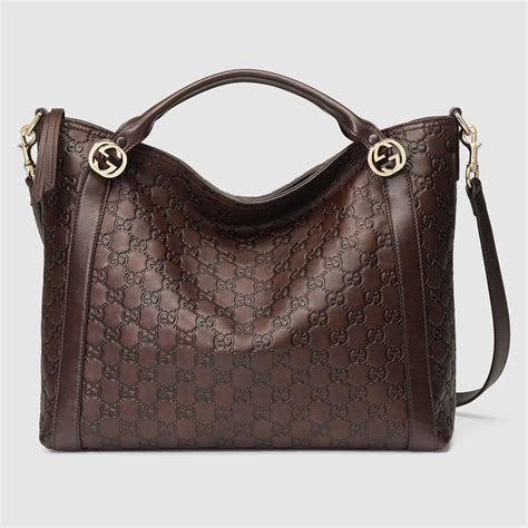 brown gucci side bag|Gucci brown leather shoulder bag.